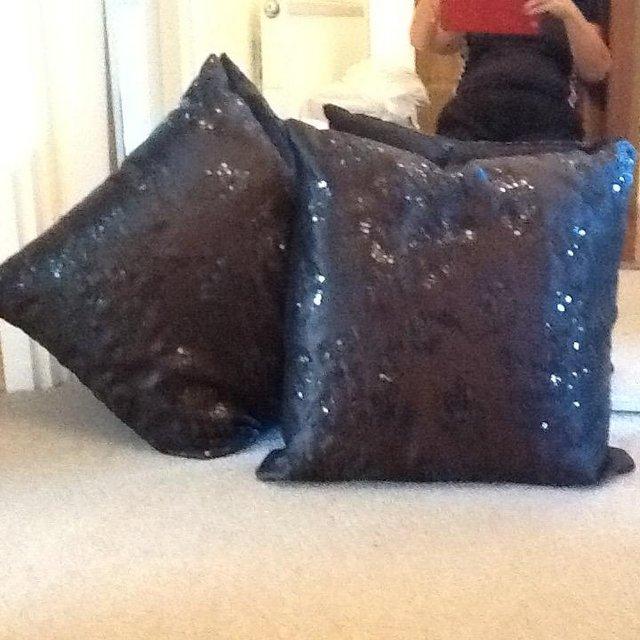 Preview of the first image of Black sequinned cushions for sale.