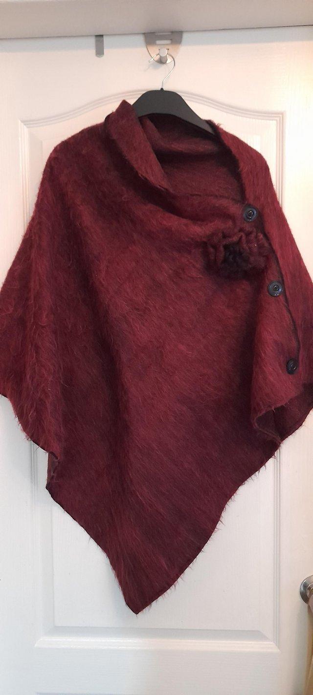 Preview of the first image of Dark burgundy coloured ladies Wrap.