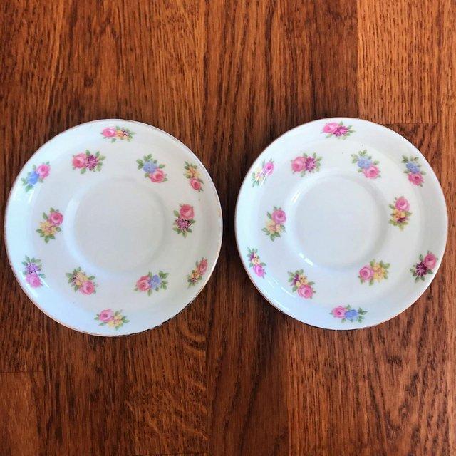 Preview of the first image of 2 Tuscan China saucers, small floral sprays. £3 ovno both..