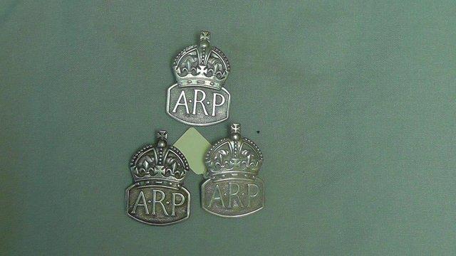 Preview of the first image of Three Silver A.R.P. Badges for sale as a single lot..