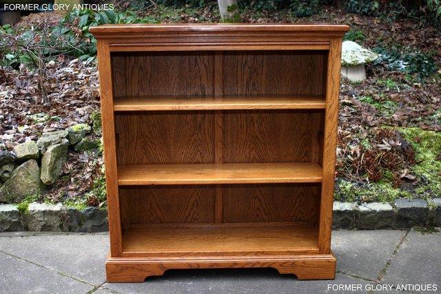 Preview of the first image of AN OLD CHARM VINTAGE OAK OPEN BOOKCASE CD DVD CABINET STAND.