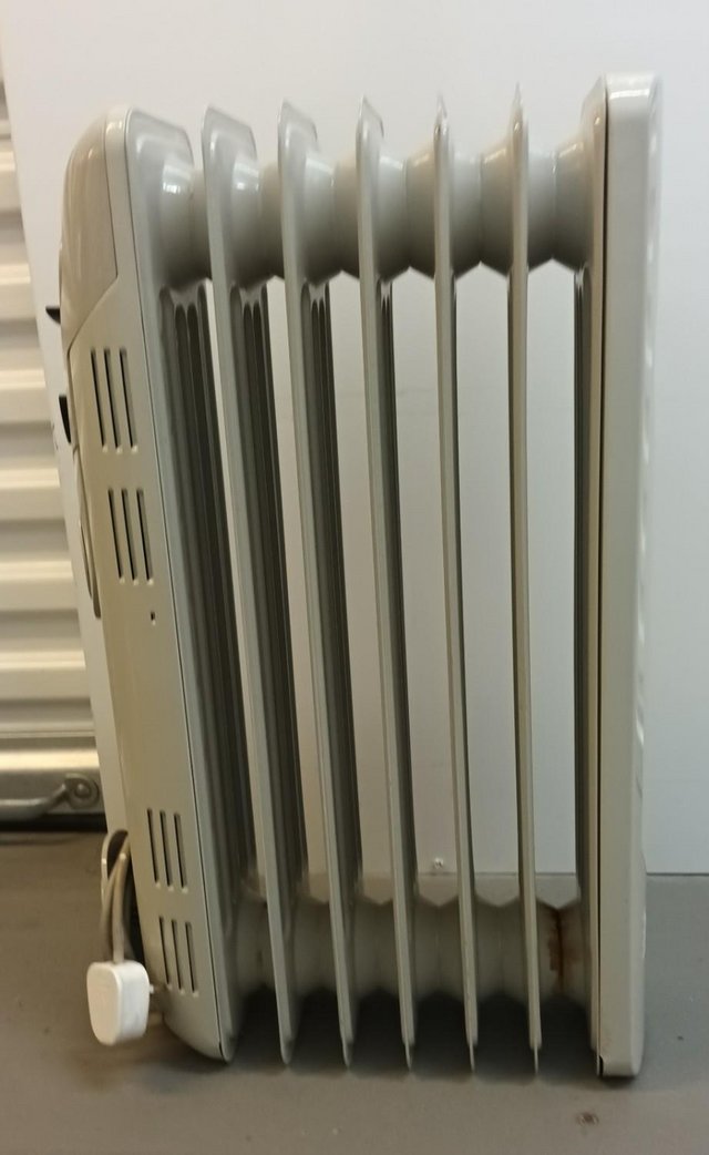 Preview of the first image of 1500W DIMPLEX 7 FIN OIL FILLED RADIATOR.