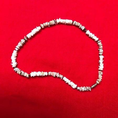 Image 1 of Puka shell necklace. Happy to post.
