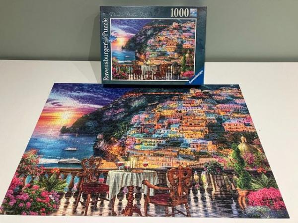 Image 1 of Ravensburger 1000 piece titled Dinner in Positano Italy