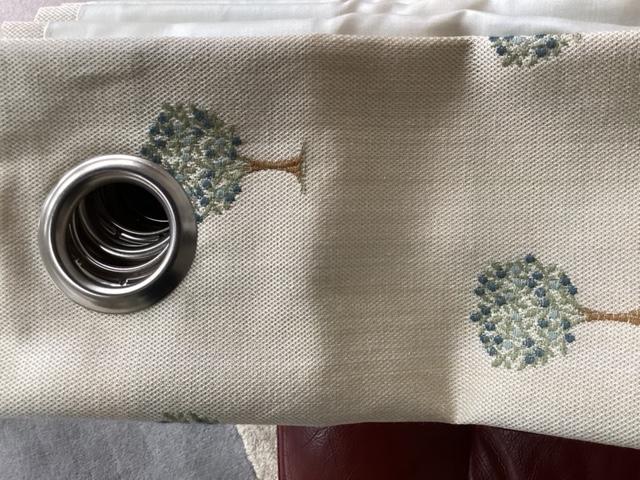 Preview of the first image of One pair of Fully lined curtains with eyelet holes.