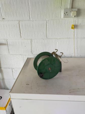 Image 1 of Electric fence wire on winding reel