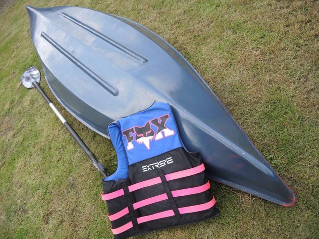 Preview of the first image of SINGLE SEAT GRP KAYAK CANOE WITH PADDLE AND LIFE JACKET.