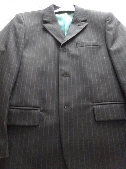 Preview of the first image of BOYS GOOD QUALITY SUIT WOOL AND POLYESTER FABRIC.