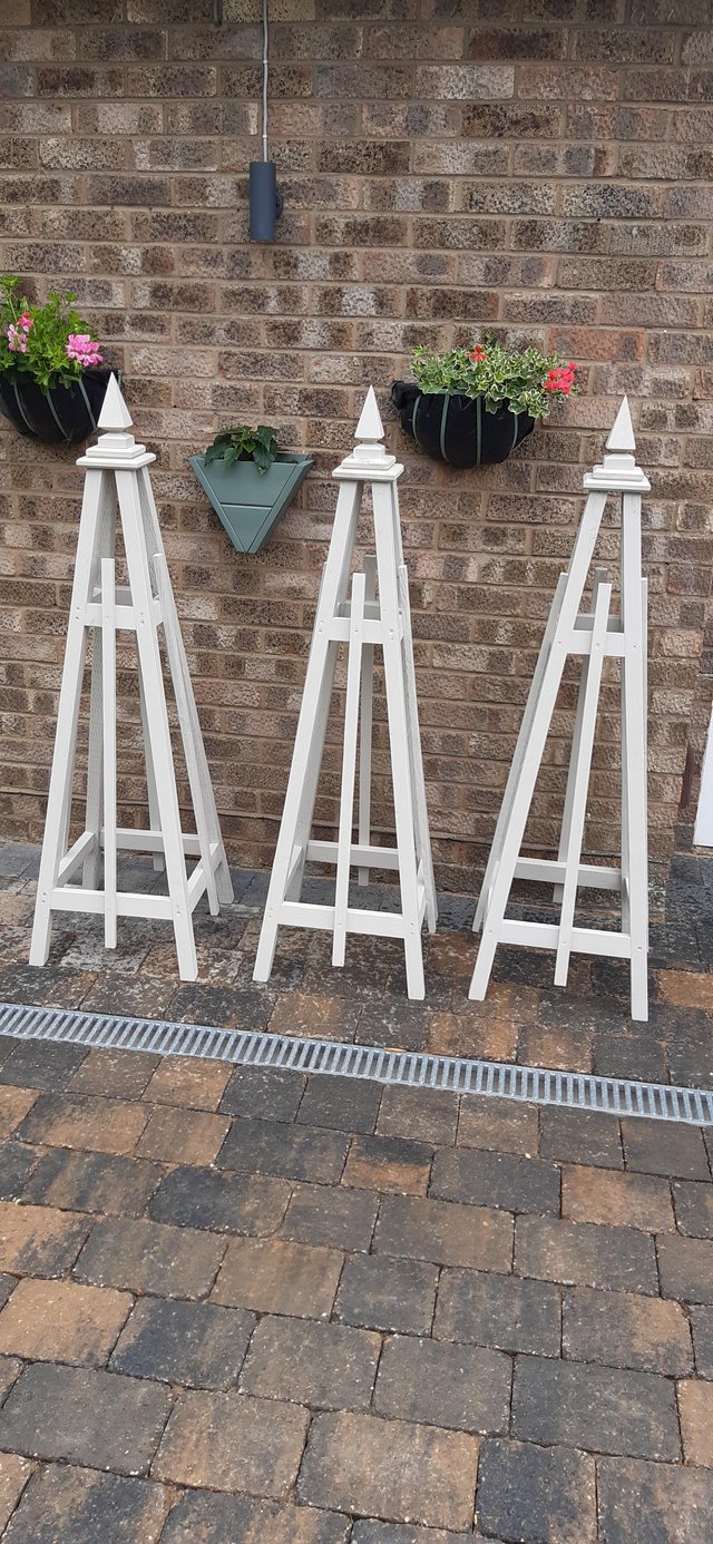 Preview of the first image of GARDEN WOODEN OBELISKS £45 EACH.