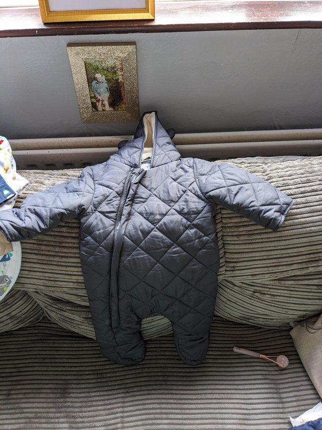 Preview of the first image of Baby snowsuit in really good condition.