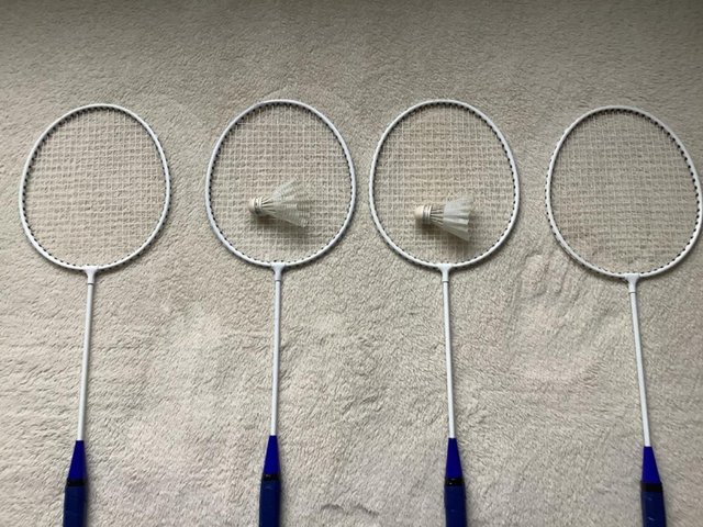 Preview of the first image of 4 BADMINTON RACQUETS & 2 SHUTTLE COCKS.