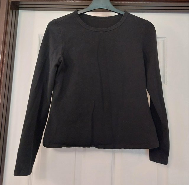 Preview of the first image of Shein black long sleeved top size medium.