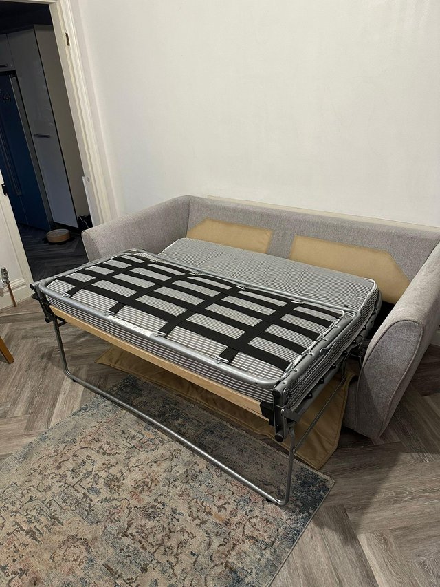 Preview of the first image of Bed settee with metal frame and sprung base.