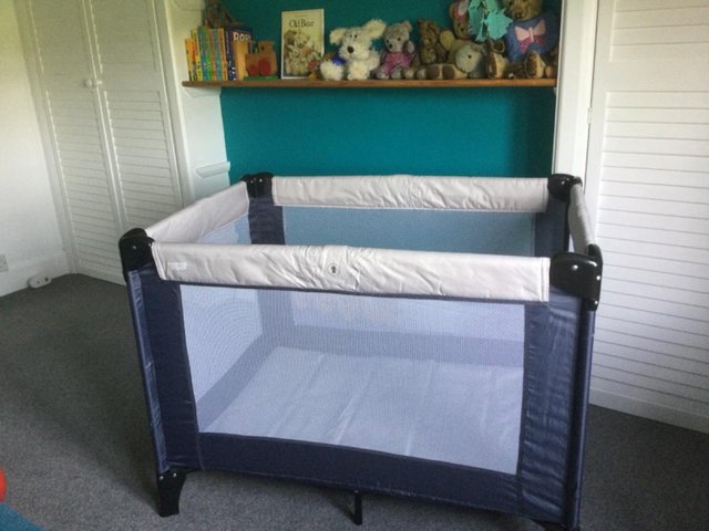 Preview of the first image of Mamas and Papas Classic Travel Cot + Mattress in EXC.