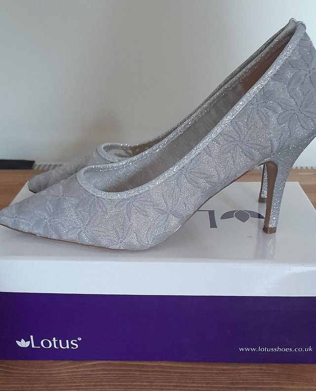 Preview of the first image of Lotus Heeled Court Shoe in Silver.