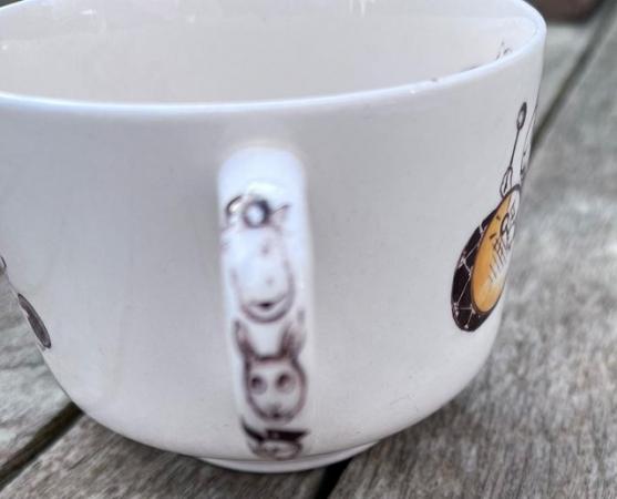 Image 2 of Porcelain cup with sporty animal characters