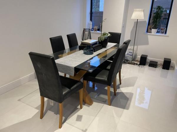 Image 1 of Glass Kitchen Table Solid Oak Legs and Six Chairs