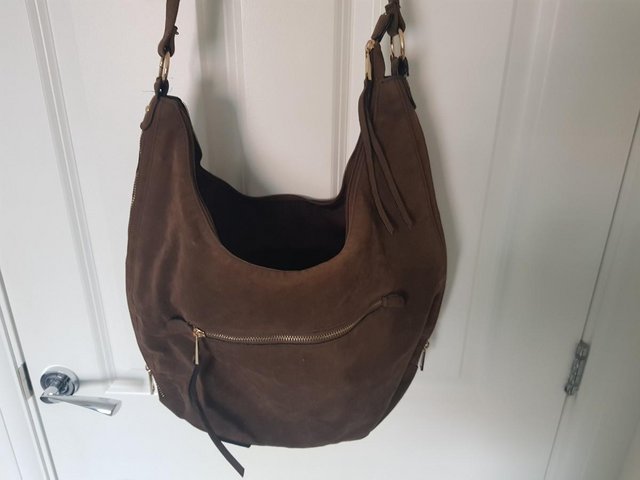 Preview of the first image of Brown suede handbag from Matalan.
