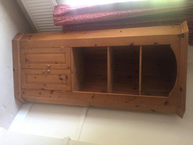 Preview of the first image of Pine corner shelf unit with cupboard.