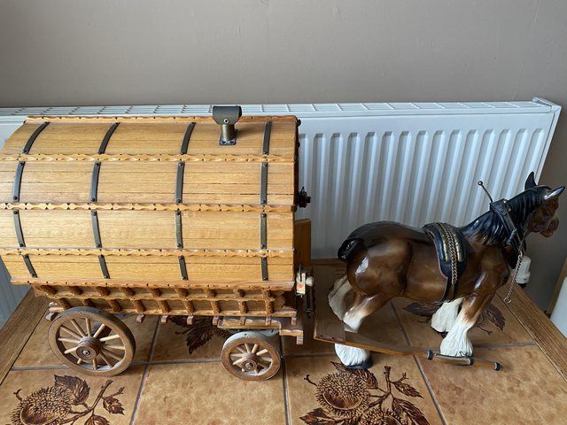 Preview of the first image of Vintage gypsy style wooden caravan and shire horse.