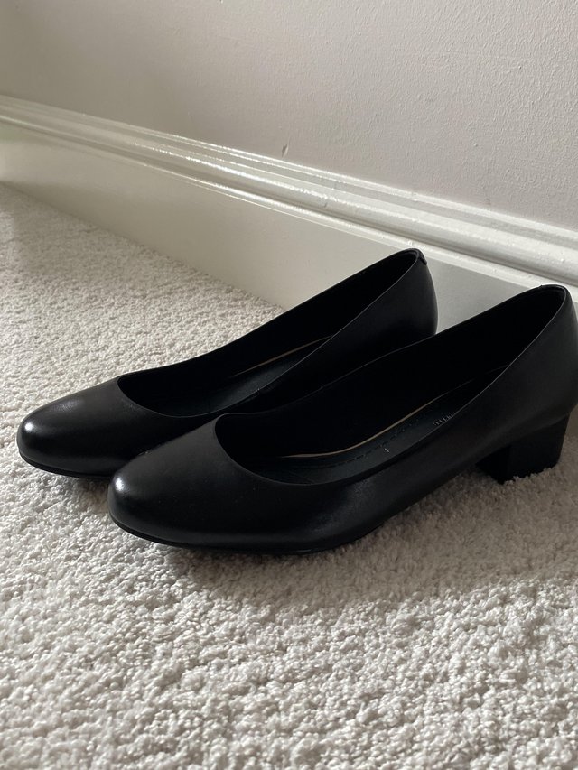Preview of the first image of Women's Black Heeled Ballet Pumps.
