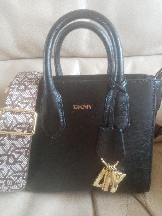 Preview of the first image of Dnky small nearly new handbag.