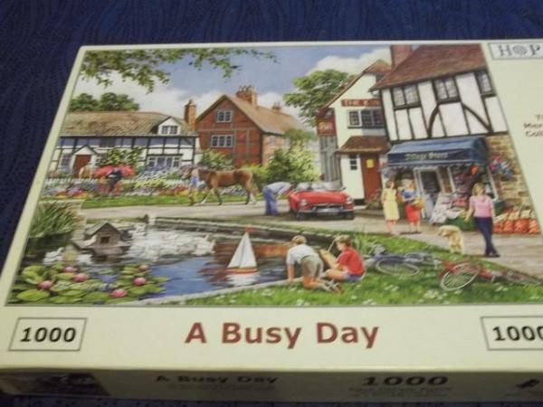 Image 1 of A BUSY DAY House of Puzzles 1000 piece Jigsaw puzzle