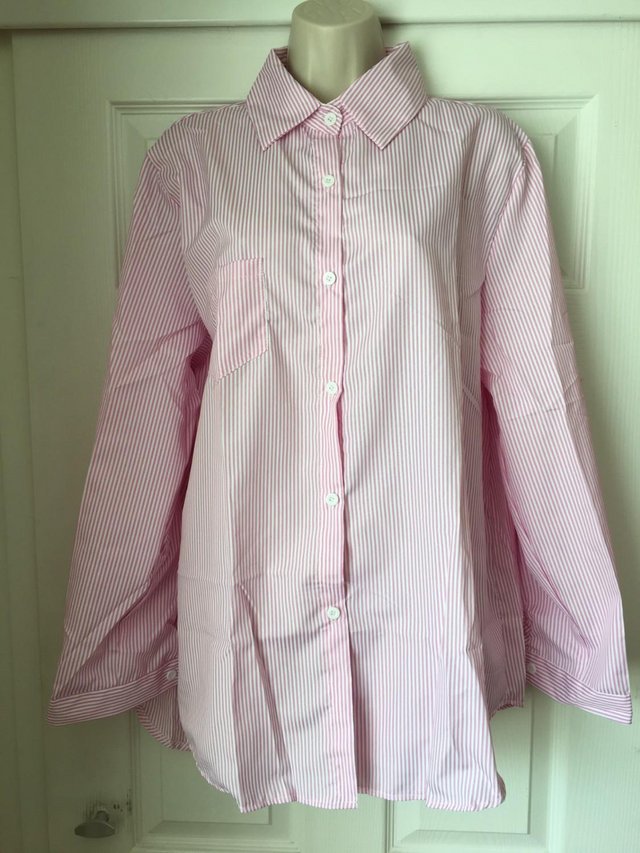Preview of the first image of Ladies Pink Stripped Long Sleeved Shirt Size 2XL Bust 48".