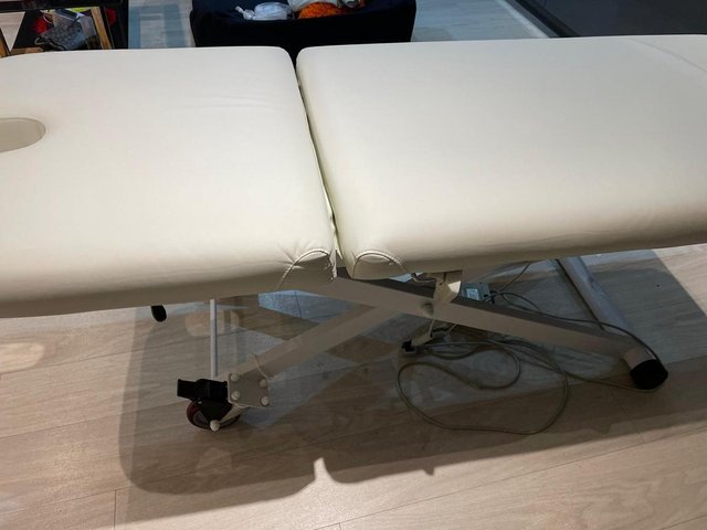 Preview of the first image of 1 year old electric Massage table.