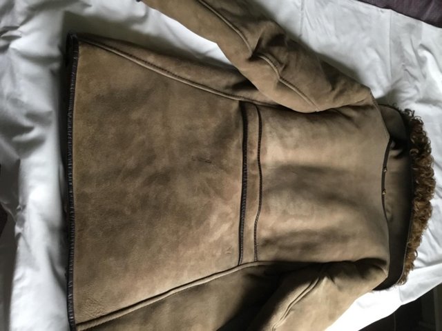 Preview of the first image of SHEEP SKIN JACKET BE COSY and WARM  when its FROSTY and COLD.