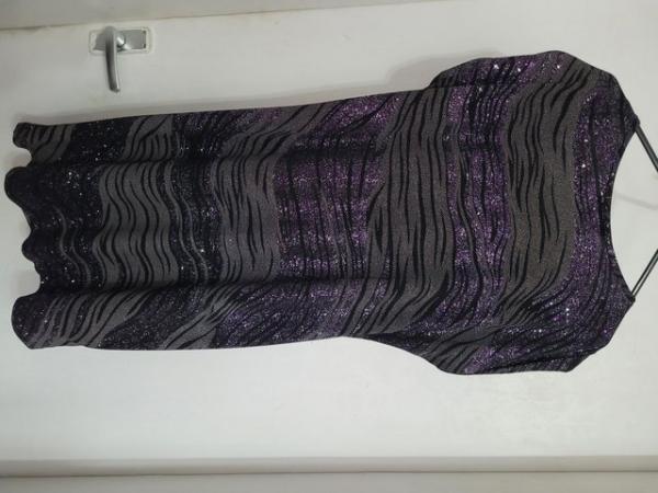Image 1 of black and grey with purple sparkles tunic top. loose fitting