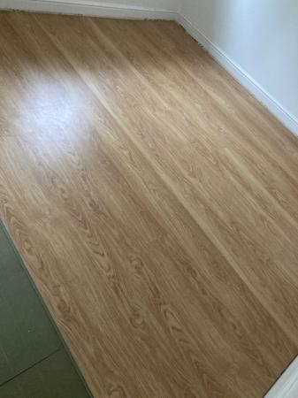 Image 3 of Golden oak effect laminate flooring