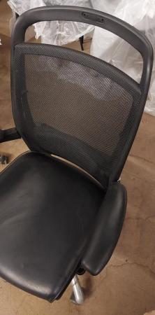 Image 3 of Black office chair with leather seat and netted back