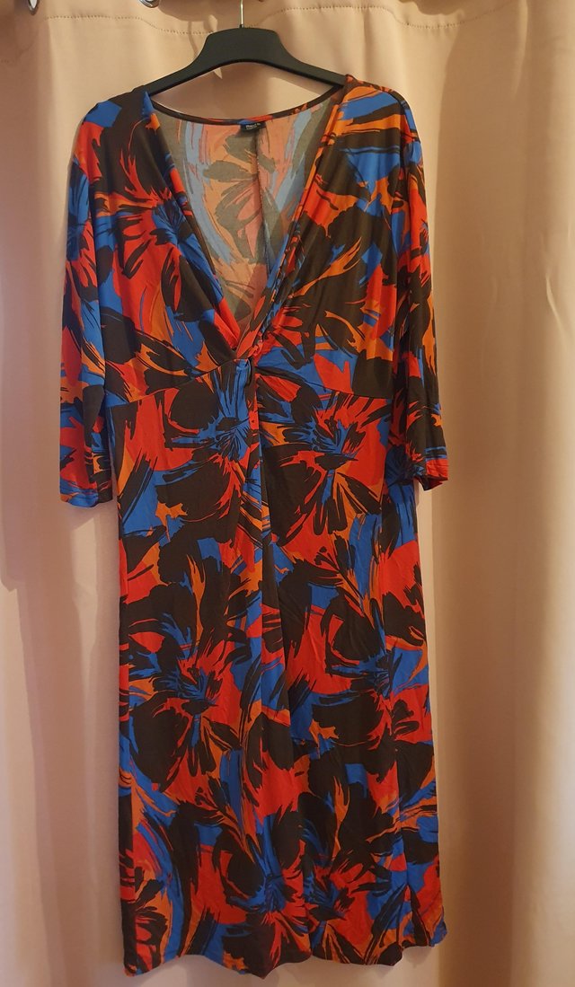 Preview of the first image of Knot Front Jersey Long Sleeved Midi Dress, size 22..