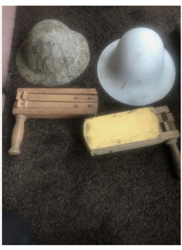 Preview of the first image of soldiers tin helmets 1st or 2nd war ? Wooden gas rattles ?.