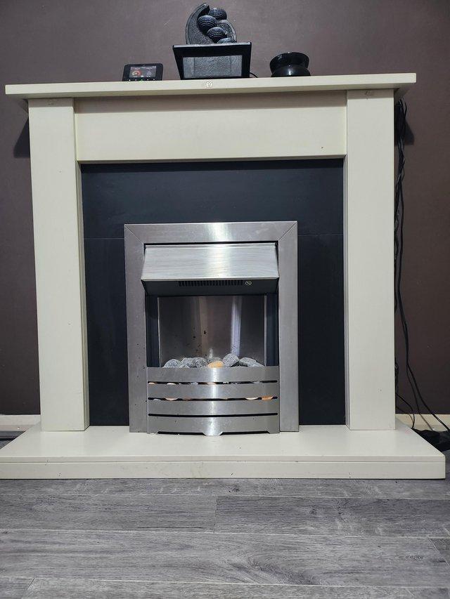 Preview of the first image of Electric fire place with sorround.