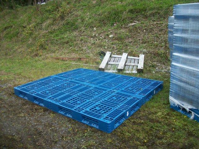 Preview of the first image of plastic pallets, soakaway decking,log store,awning,.