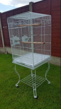 Image 15 of Large bird cage with stand , comes with perches , feeders
