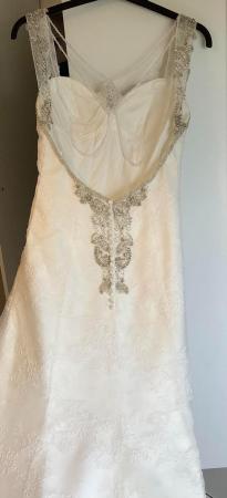Image 2 of Ivory lace wedding dress with low back and beading detail