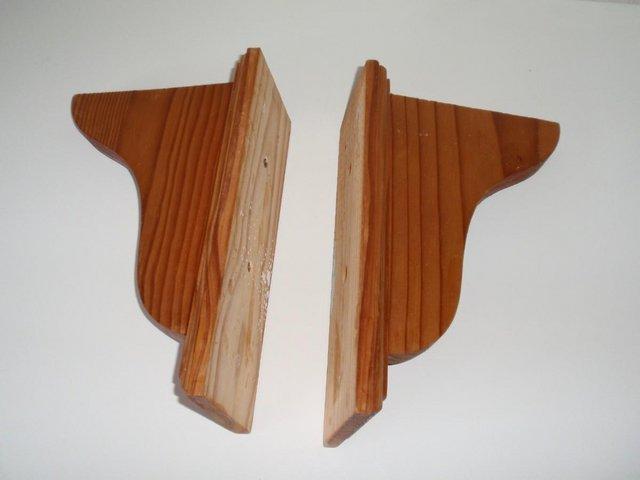 Preview of the first image of Pair of Shaped Pine Wood Wall Brackets.
