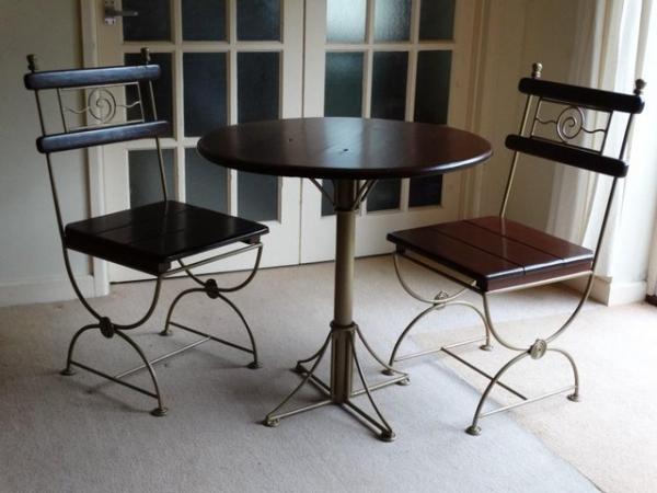 Image 2 of Handmade dining table and two chairs, wood and metal.