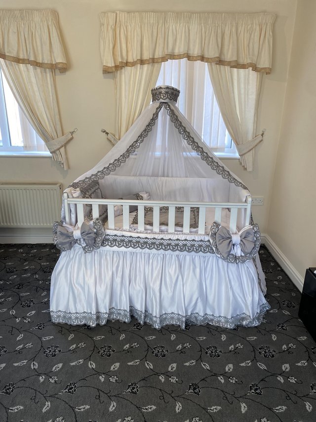Preview of the first image of Designer  handmade satin light gray/ silver baby’s cot.