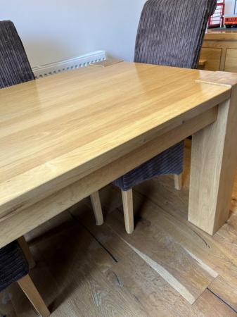 Image 3 of Solid oak dining room table and four chairs
