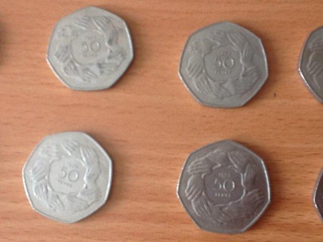 Preview of the first image of 1973 ( HANDS ) LARGE 50p COINS.