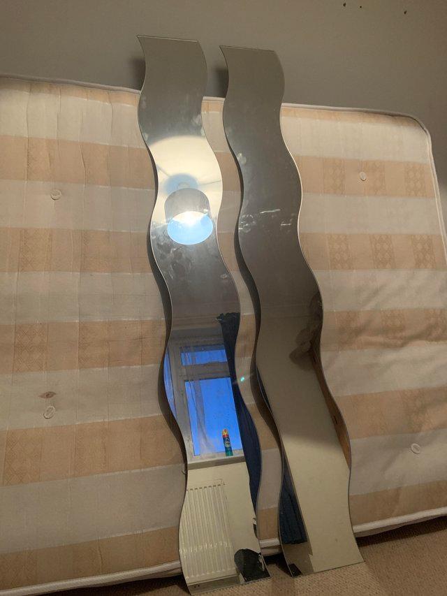 Preview of the first image of 2 curved mirrors good condition.