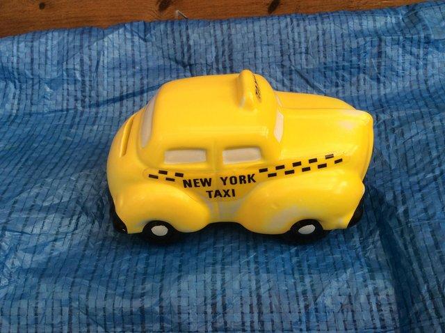 Preview of the first image of NEW YORK YELLOW TAXI CAB MONEY BOX.