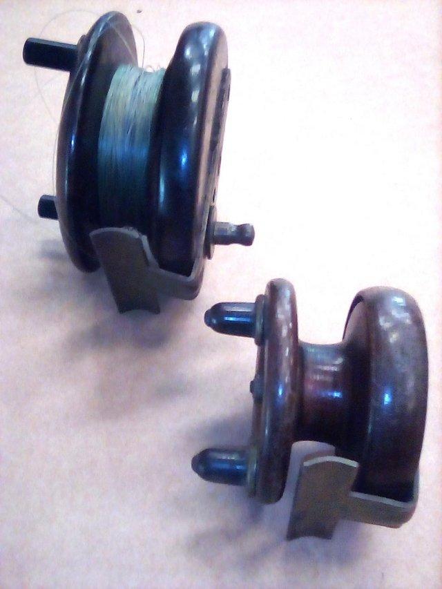 Preview of the first image of Vintage wooden fishing reel.