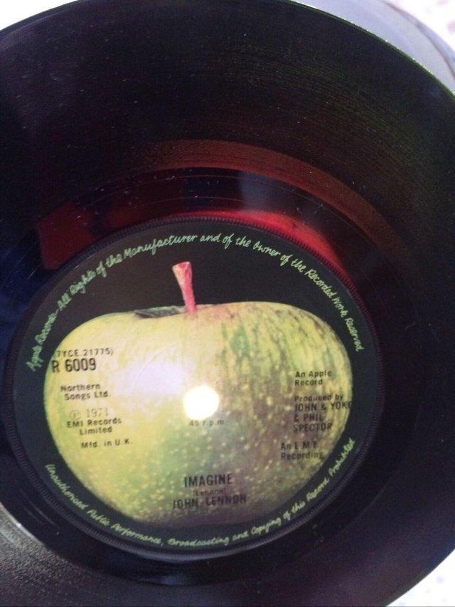 Preview of the first image of John Lennon Imagine 7"Translucent Red Vinyl Contract Press.