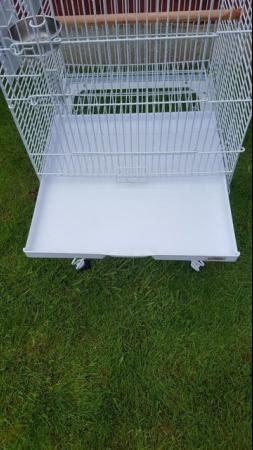 Image 4 of Large bird cage with stand , comes with perches , feeders