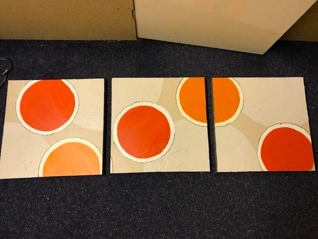 Preview of the first image of Trio of box framed pictures in oranges and beige.